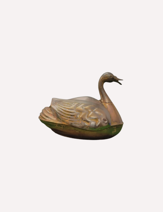 This is a Vintage brass duck shaped storage box