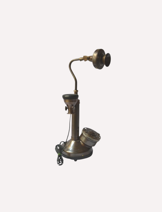 This is an 18th Century telephone made up of brass