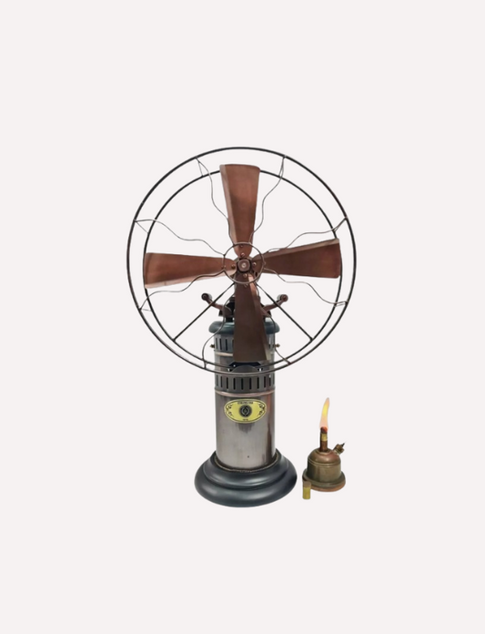 This is an 19th Century Fan made of Brass