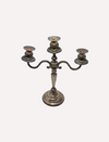 This is an 19th Century candle stand, made of brass